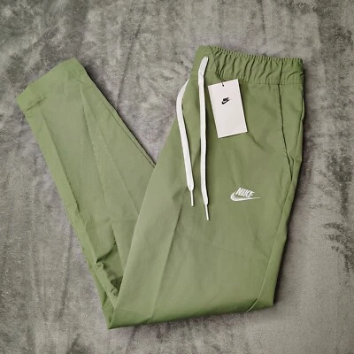Pantalones deportivos Nike Club tejidos pierna cónica para hombre pequeños verde aceite DX0623-386 NUEVOS CON ETIQUETAS Foto 1 de 4