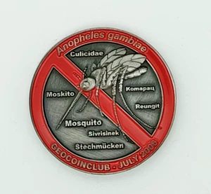 JULY 2006 GEOCOINCLUB- MOSQUITO AND POISON IVY- UNACTIVATED AND TRACKABLE - Picture 1 of 3