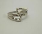 Sterling silver wavy & shiny and brushed silver 2 synthetic diamonds ring size M
