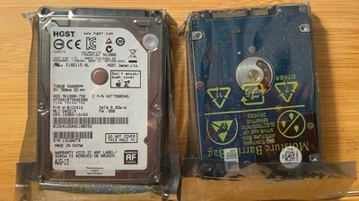 NEW MFG SEALED HTS541075A9E680 H2T750854S MLC: DA5218 PN:  0J22412 750GB 2.5" - Image 1 of 3