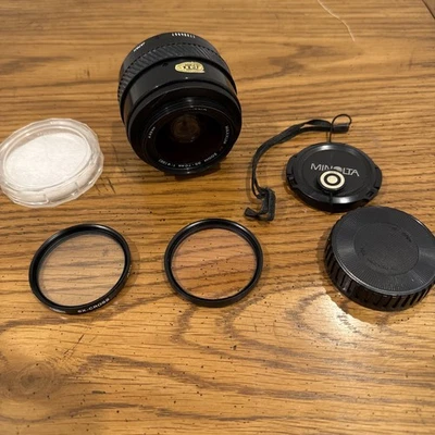 Minolta Maxxum AF Zoom Lens 35-70mm  1:4 (22) 49mm Lens with Caps and Filters - Image 1 of 4