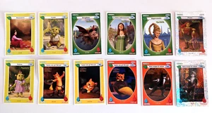 Lotto 12 Carte - Dreamworks Gatto con gli stivali Shrek - Despar - Foto 1 di 4