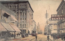 Washington St 1908 Portland, Oregon: Wright Dentist, street car, bikes POSTCARD