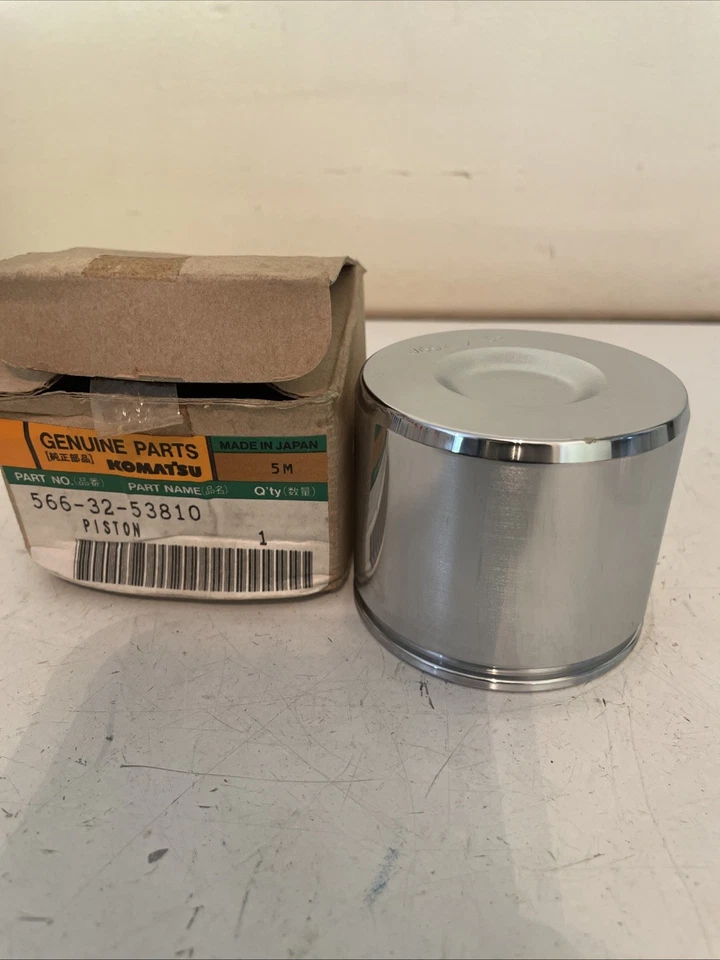 GENUINE KOMATSU PISTON 566-32-53810 NEW OEM - Image 1 of 4
