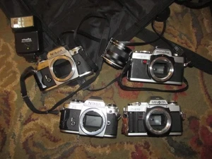 2 Nikon FG 2 Minolta one X370 one XR7 Camera Lot PARTS - Picture 1 of 9