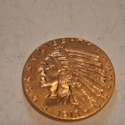 Moneda de águila cuarto cabeza india de 2,5 dólares de oro de Estados Unidos de 1913 Foto 1 de 2