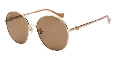 Gafas de sol para mujer Gucci GG1090SA-003 doradas y rosas/marrones espejadas Foto 1 de 4
