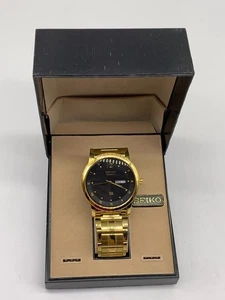 Seiko Quarz schwarzes Zifferblatt vergoldet Tag/Datum Edelstahl Unisex Armbanduhr - Bild 1 von 9