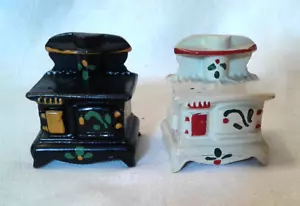 Set vintage di stufe antiche in ghisa sale e pepe agitatori - Foto 1 di 6
