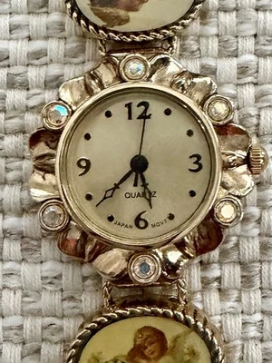 Reloj pulsera vintage dorado con eslabones de cadena esfera expuesta estilo renacimiento romántico Foto 1 de 4