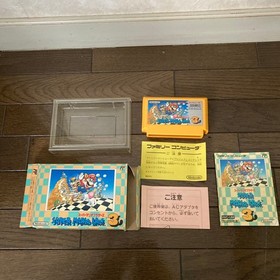 Super Mario Bros. 3 Family Computer with box, one ear missing
