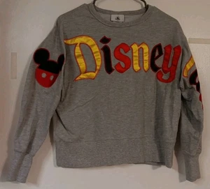 Top corto pulóver recortado Disneyland Mickey Mouse para mujer gris talla XS parques de Disney - Imagen 1 de 5