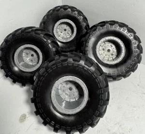 4x Axial SMT10 BKT 1/10 Monster Truck Tires on 12mm Hex Wheels Used Grave Digger - Picture 1 of 10