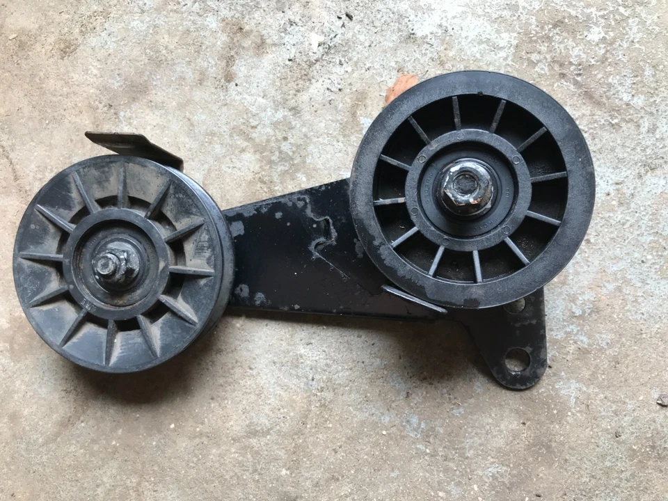 Poulan PB195H42LT (960420036-04)  IDLER ARM & PULLEYS - Image 1 of 4