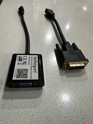 Mini HD To VGA Adapter And DVI Male To HDMI Female Adapter. - Image 1 of 4