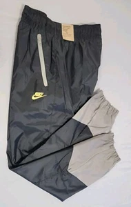 NIKE WINDRUNNER WOVEN LINED PANTS BLACK/DARK STUCCO MEN'S SZ L DX0653 014 NWT. - Picture 1 of 11