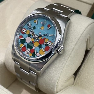 ROLEX OYSTER PERPETUAL 36mm TURQUOISE BLUE CELEBRATION DIAL ref: 116000 - Picture 1 of 10
