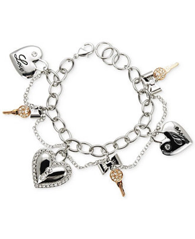 NUEVO CON ETIQUETAS Pulsera Guess Plata y Oro Rosa Metal Transparente Estrás Corazón y Llaves Dijes Foto 1 de 1