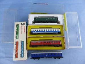 ARNOLD RAPIDO lot de 4 wagons voyageurs + boite , réf : 0330 0341 0344 et 0349 - Imagen 1 de 5