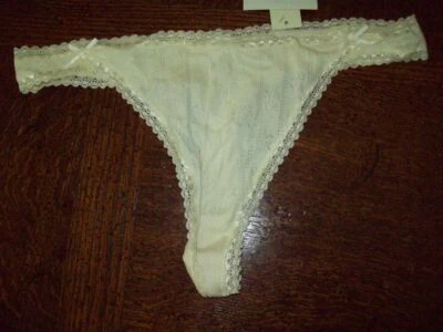 全新带标签 DKNY MODAL/COTTON POINTELLE THONG PANTIES 476687 DPA CREME M — 第 1/2 张图片