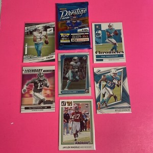🎉Miami Dolphins Tua Waddle Holland RC Prestige Nfl Sealed🎉