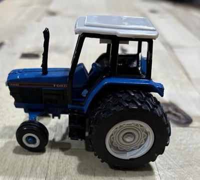 Ertl 1/64 Ford 8340 Duals Rear Tires Farm Tractor Blue Diecast Toy - Image 1 of 4