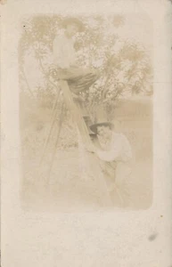 Antique RPPC Real Photo Postcard Men Friends Ladder Hats Winking Fun Pose Tree - Picture 1 of 7