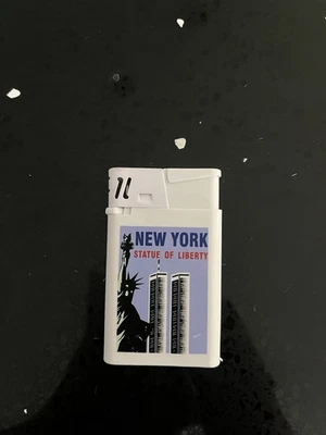 Vintage New York Statue of Liberty Twin Towers White Lighter - Image 1 of 2