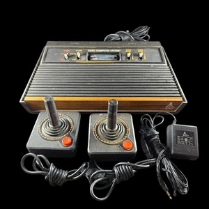 Atari 2600 Wood Grain Vintage Console W/ Cord Repair Tested Working 2 Remotes - Picture 1 of 8