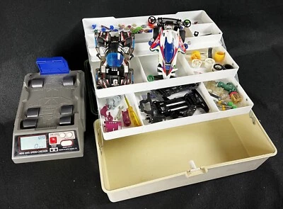 TAMYA Mini 4 WD Cassetta ricambi vintage (Boomerang Brocken) + Speed checker - Immagine 1 di 4