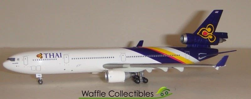 AVIÃO DRAGON WINGS THAI AIRWAYS INTERNATIONAL MD-11 HS-TMD 11870 55392 1:400 - Imagem 1 de 1