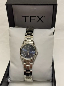 TFX Ladies Silvertone Calendar Watch Blue Dial in Box with Manual - Picture 1 of 7