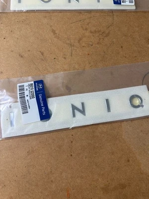 NEW 2017 TO 2022 HYUNDAI IONIQ REAR TRUNK LID EMBLEM OEM 86310 G2000 / SU 2177 - Image 1 of 3