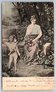Artist Postcard Lady with Cupid in the Garden Romania Posted - Foto 1 di 2