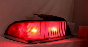 1992-1994 MERCURY GRAND MARQUIS TAIL LIGHT OUTER LEFT WITH HARNESS MOUNTING NUTS - Picture 1 of 14