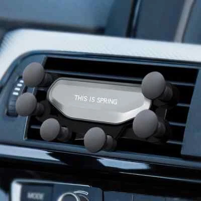 Soporte universal de montaje de ventilación de aire para automóvil gravedad 360° para teléfono móvil GPS Foto 1 de 4