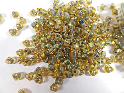 100 Miyuki Transparent Color-Lined Amber & Grey Glass TRIANGLE BEADS - Image 1 of 2