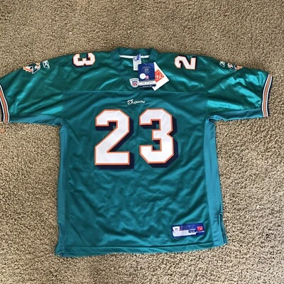 JERSEY LOCAL AUTÉNTICO DE RONNIE BROWN MIAMI DOLPHINS REEBOK 54 XXL NUEVO CON ETIQUETAS AQUA Foto 1 de 4