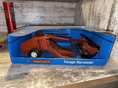 1/64 Scale  Hesston Forage Harvester With Corn And Hay Head Die-Cast Ertl - Image 1 of 4