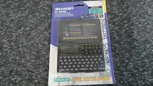 Sharp EL-6590B Elektroniczny organizer Memo Master - FABRYCZNIE NOWY ZAPIECZĘTOWANY! - Zdjęcie 1 z 2