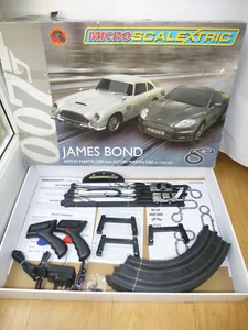 007💥SCALEXTRIC SKYFALL JAMES BOND50TH MICRO QUANTUM SOLACE AUSTIN MARTIN DB5SET - Picture 1 of 12