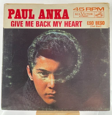 PAUL ANKA - GIVE ME BACK MY HEART / ESO BESO (THAT KISS)—VG+ - Image 1 of 4
