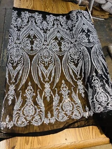 SILVER DAMASK SEQUINS DESIGN ON A BLACK 4 WAY STRETCH MESH-PROM-BY YARD. - Picture 1 of 1
