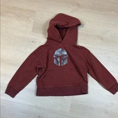 Moletom com capuz GAP Kids Star Wars laranja queimado com design de capacete metálico MANDALORIAN - Imagem 1 de 4