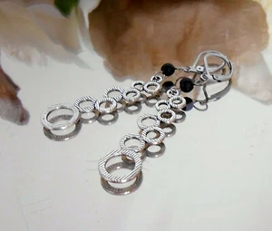 Lange Ohrhänger Kreise mit Glas Perle in schwarz und Edelstahl Brisur - Ohrringe - Bild 1 von 4