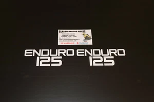 125 DTMX YAMAHA ANNEE 1977 EMBLEMES CACHES LATERAUX - Picture 1 of 3