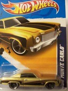 2012 Muscle Mania - GM '70 Monte Carlo 107/247 (Gold with Black) - Picture 1 of 1