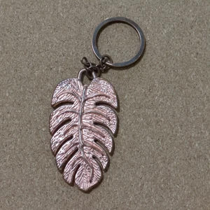 Monstera Hoja Llavero Cremallera Tirador Cartera Accesorio Color Cobre - Imagen 1 de 3