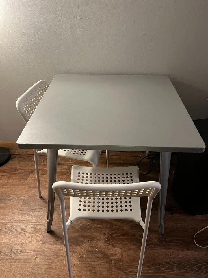 Wayfair table and ikea chairs - Image 1 of 1