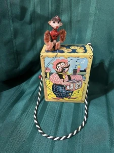 Giocattolo Music Maker Mattel 1953 vintage, WindUP smerigliatrice musicale in metallo con scimmia e corda - Foto 1 di 11